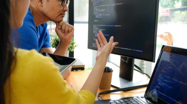 asian-female-programmers-are-pointing-at-their-7NDKJGM
