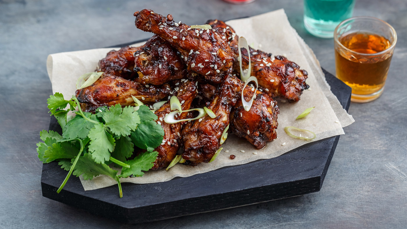 baked-chicken-wings-with-sesame-and-sauce-food-MFRKAYT-copy