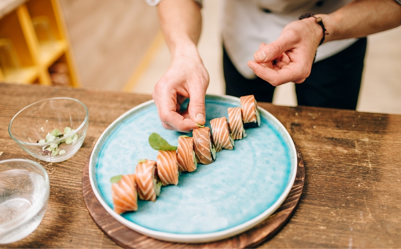 male-person-cooking-sushi-rolls-japanese-food-PU8MNT5-copy